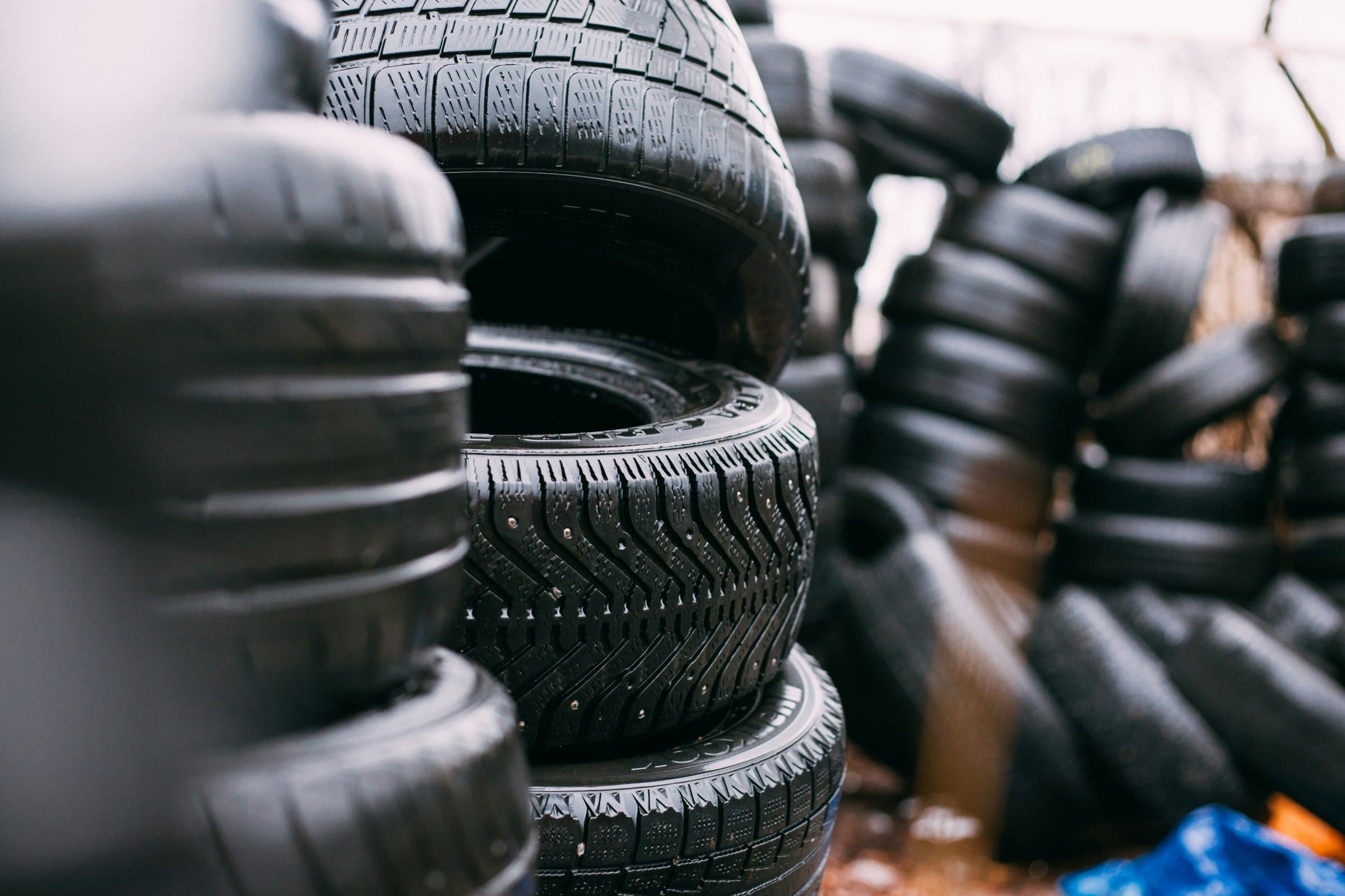 Close-up stack of tyres in the Rignall Garage workshop